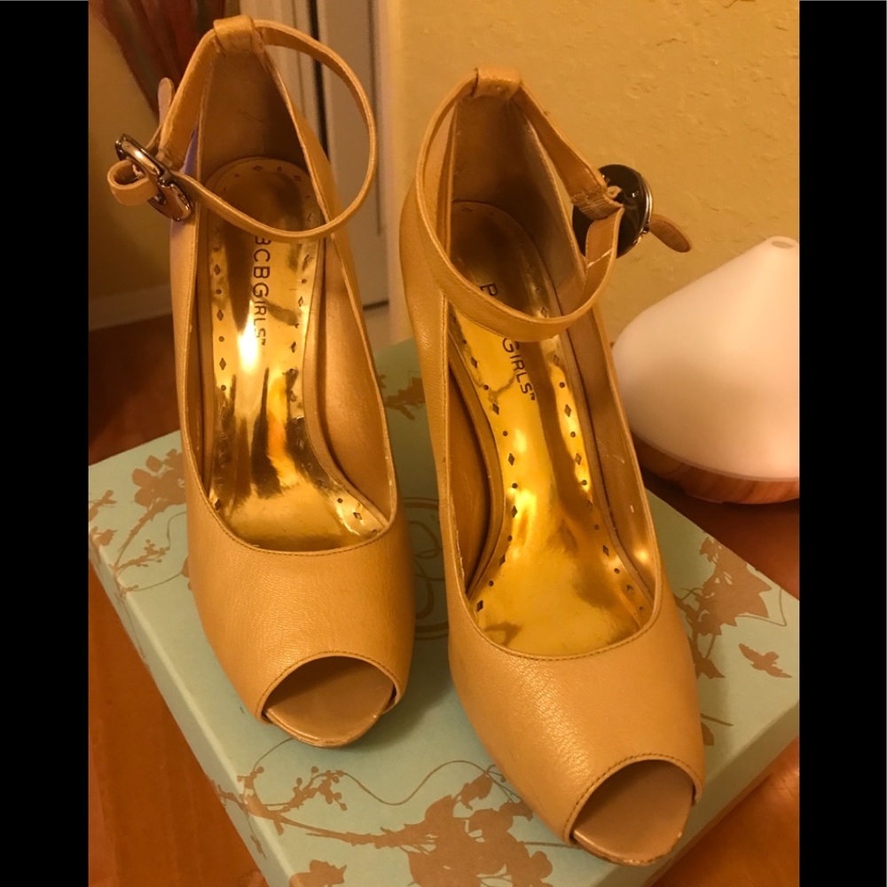 BCBGirls gold peep toe shoes